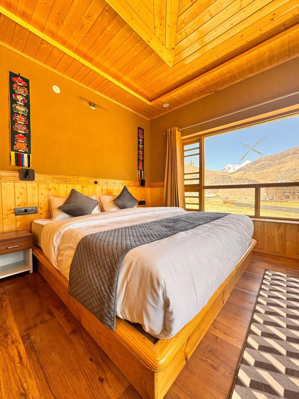 Wake up to Spiti's untouched mountain landscapes.